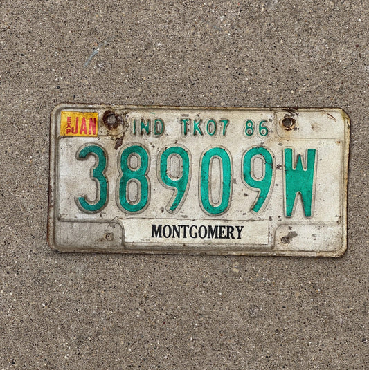 Photo of a 1986 Indiana Truck License Plate Auto Tag Garage Decor 38909 W