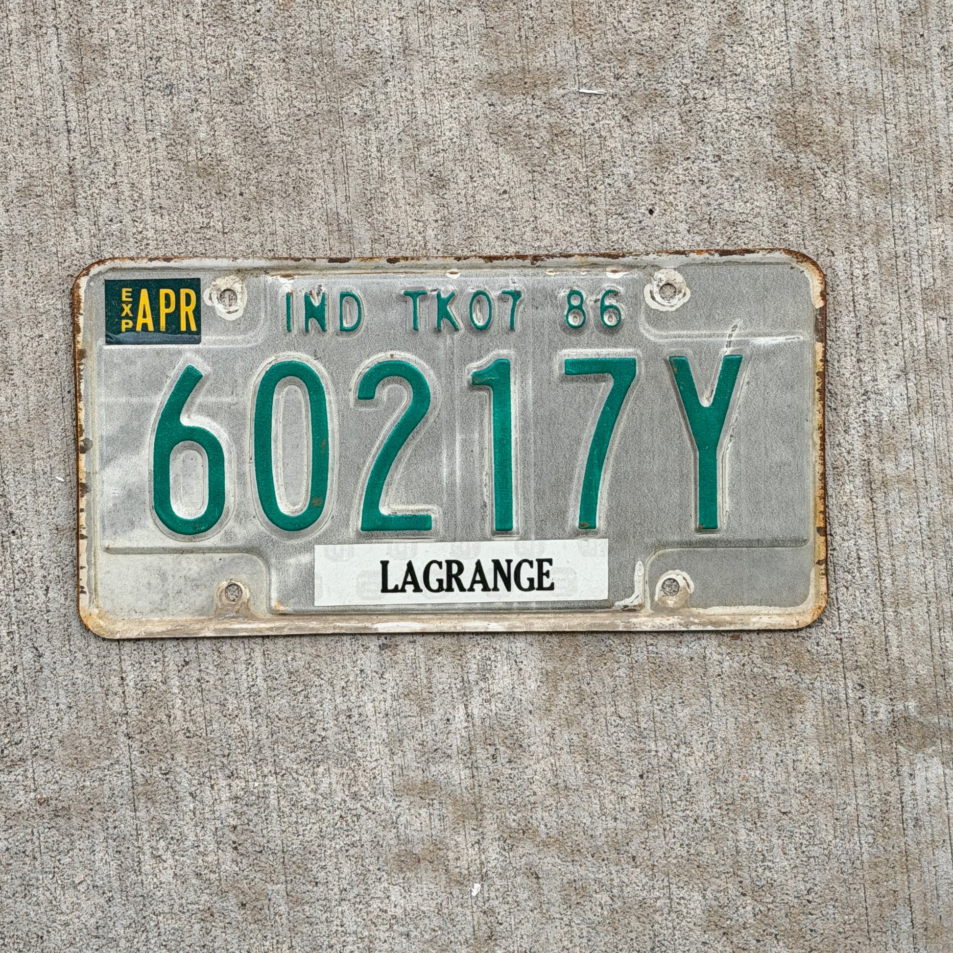 Photo of a 1986 Indiana Truck License Plate Auto Tag Garage Decor Vintage 60217 Y with original patina