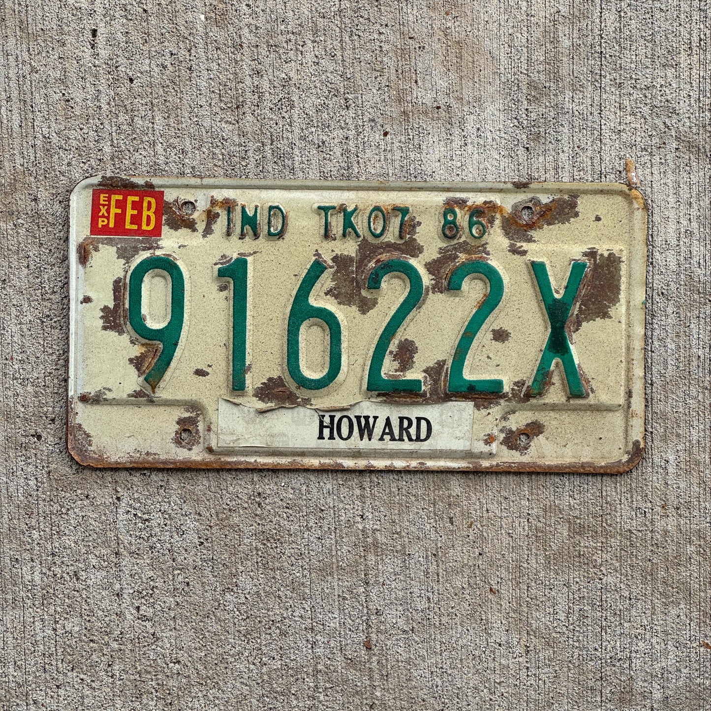 Photo of a 1986 Indiana Truck License Plate Auto Tag Garage Decor Vintage 91622 X with original patina