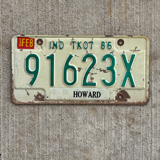 Photo of a 1986 Indiana Truck License Plate Auto Tag Garage Decor Vintage 91623 X with original patina