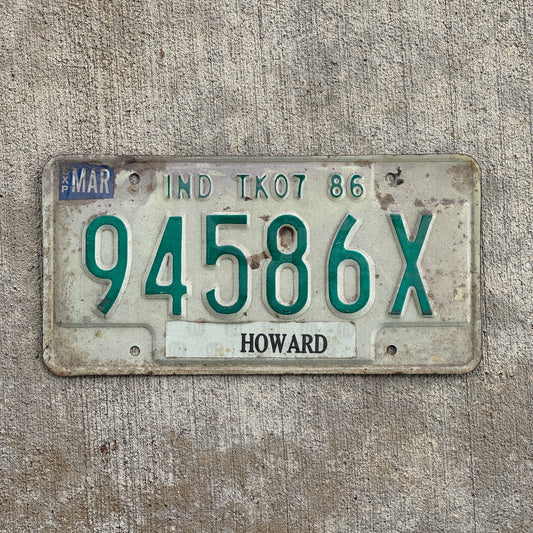 Photo of a 1986 Indiana Truck License Plate Auto Tag Garage Decor Vintage 94586 X with original patina