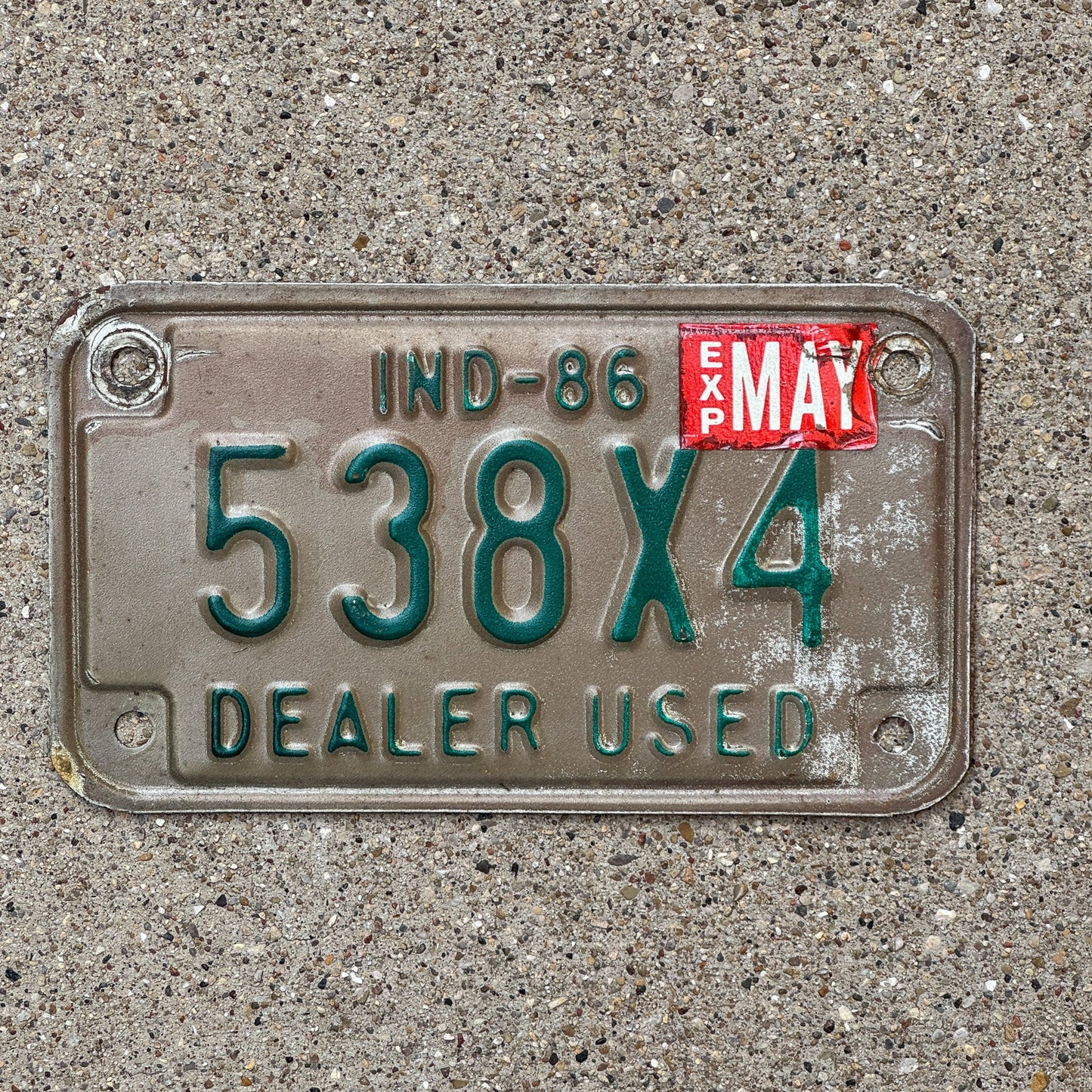 Photo of a 1986 Indiana Used Motorcycle Dealer License Plate Auto Tag Garage Decor Vintage 538 X 4 with original patina