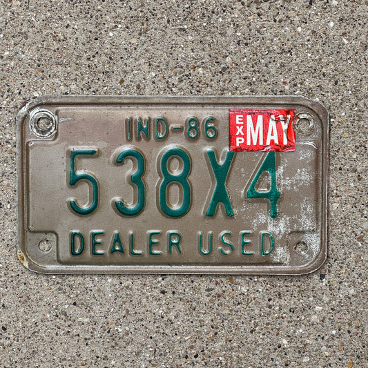 Photo of a 1986 Indiana Used Motorcycle Dealer License Plate Auto Tag Garage Decor Vintage 538 X 4 with original patina