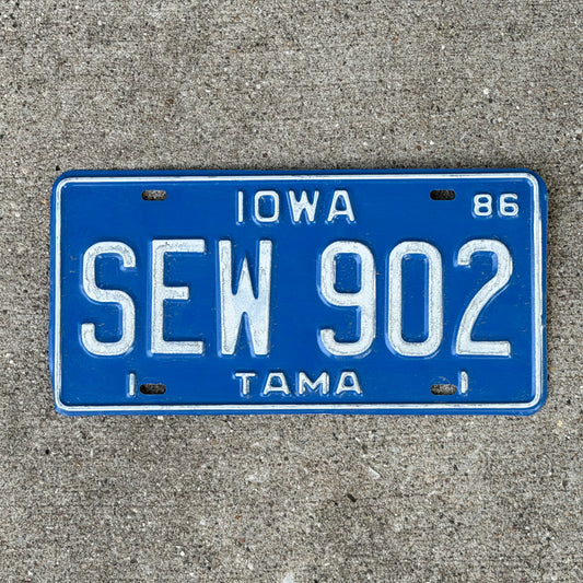 Photo of a 1986 Iowa License Plate Auto Tag Garage Decor Vintage SEW 902 with original patina