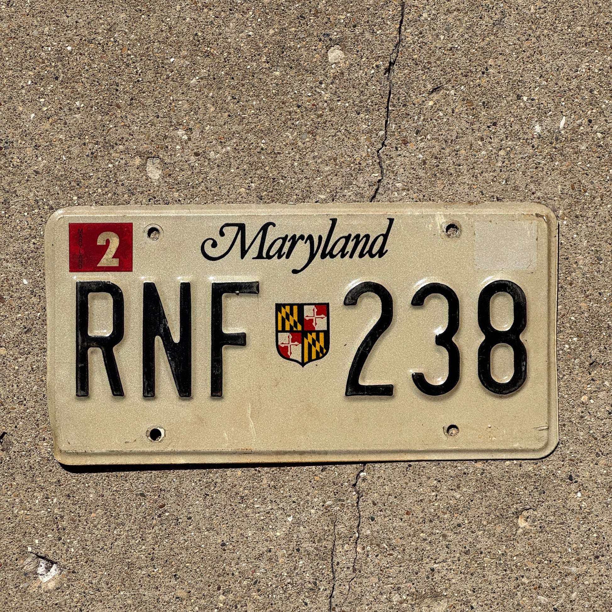 Photo of a 1986 Maryland License Plate Auto Tag Garage Decor Vintage RNF 238