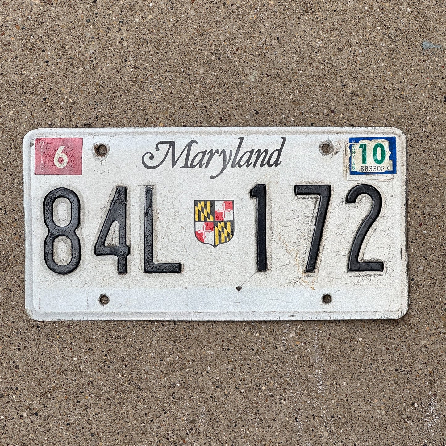 Photo of a 1986 Maryland Truck License Plate Auto Tag Garage Decor Vintage 84 L 172