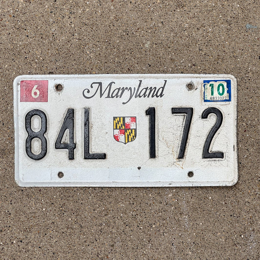 Photo of a 1986 Maryland Truck License Plate Auto Tag Garage Decor Vintage 84 L 172
