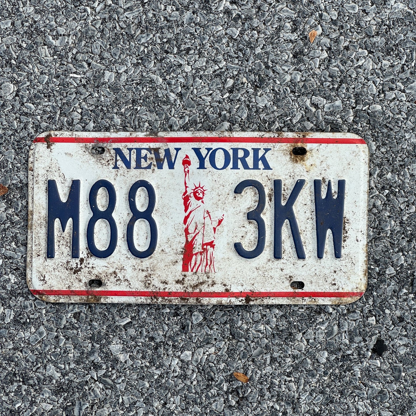 Photo of a 1986 New York License Plate Auto Tag 1 Garage Decor Liberty Base M88 3KW