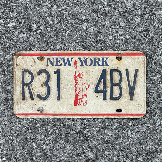 Photo of a 1986 New York License Plate Auto Tag 1 Garage Decor Liberty Base R31 4BV