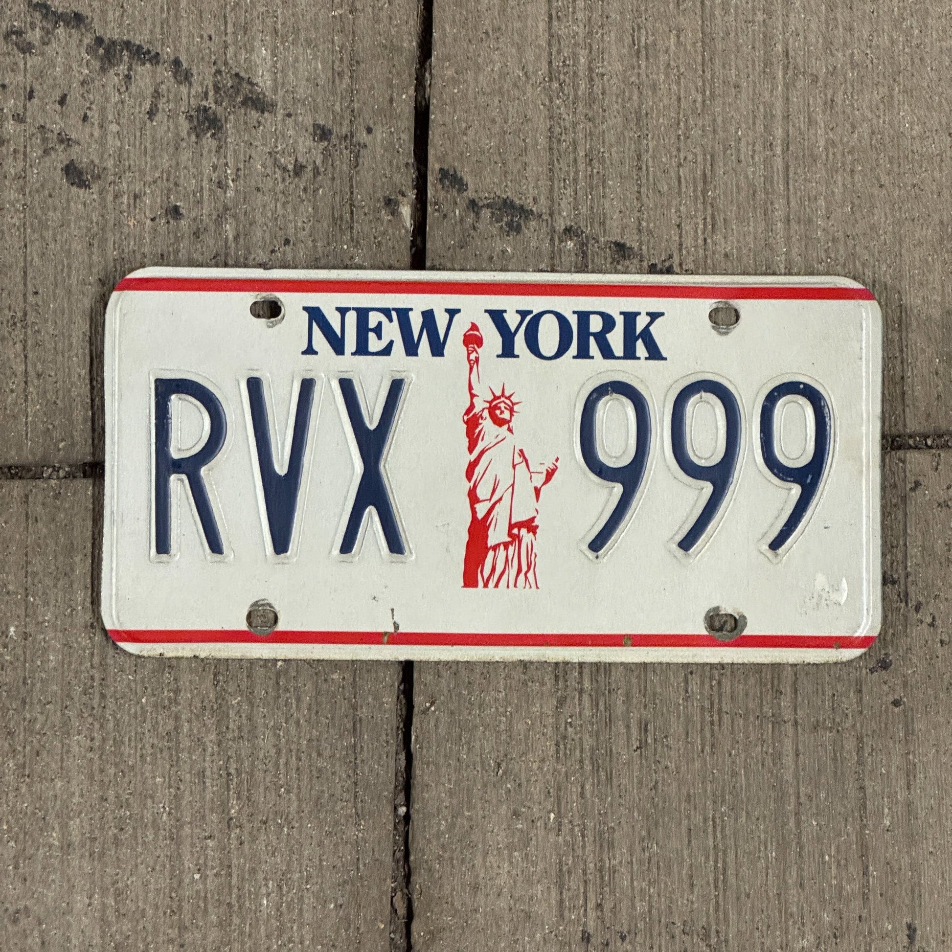 Photo of a 1986 New York License Plate Auto Tag 1 Garage Decor Repeat Repeating Liberty Base RVX 999