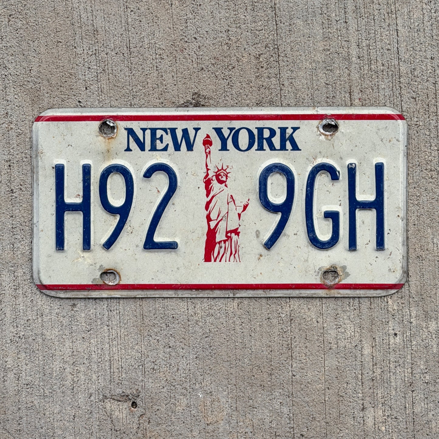 Photo of a 1986 New York License Plate Auto Tag Garage Decor Vintage H92 9 GH with original patina