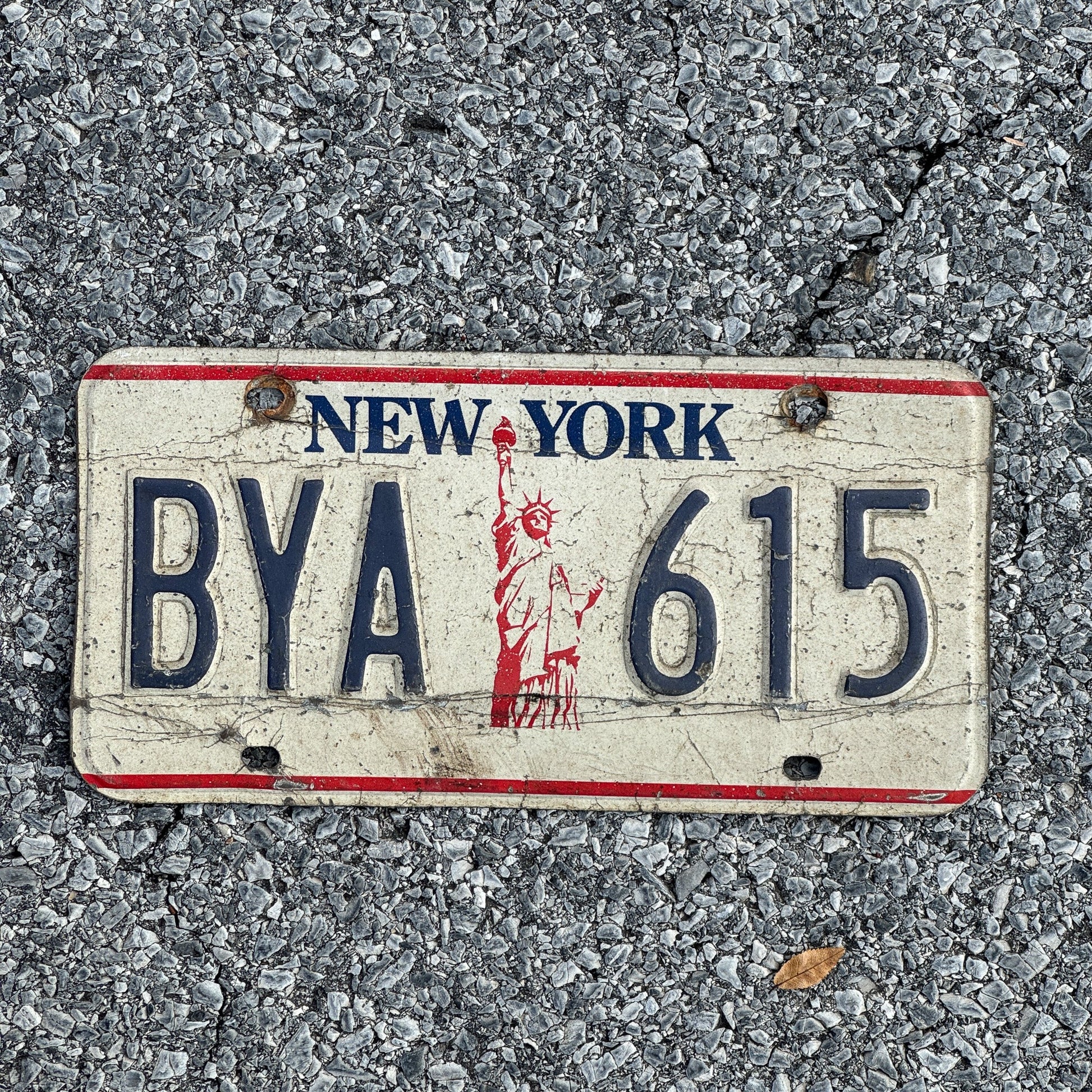 Photo of a 1986 New York License Plate Auto Tag Garage Decor Vintage Liberty Base BYA615
