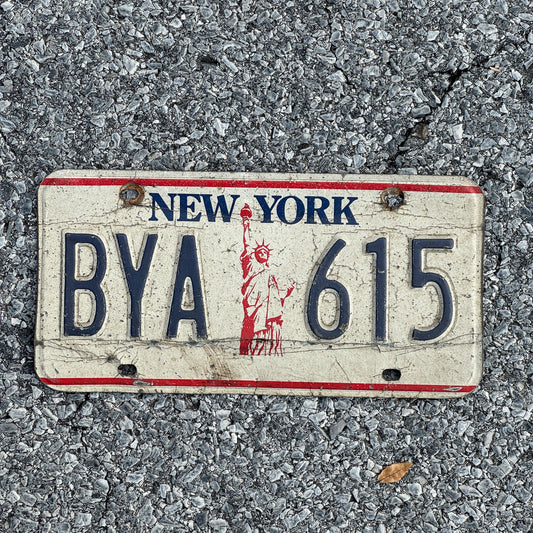 Photo of a 1986 New York License Plate Auto Tag Garage Decor Vintage Liberty Base BYA615