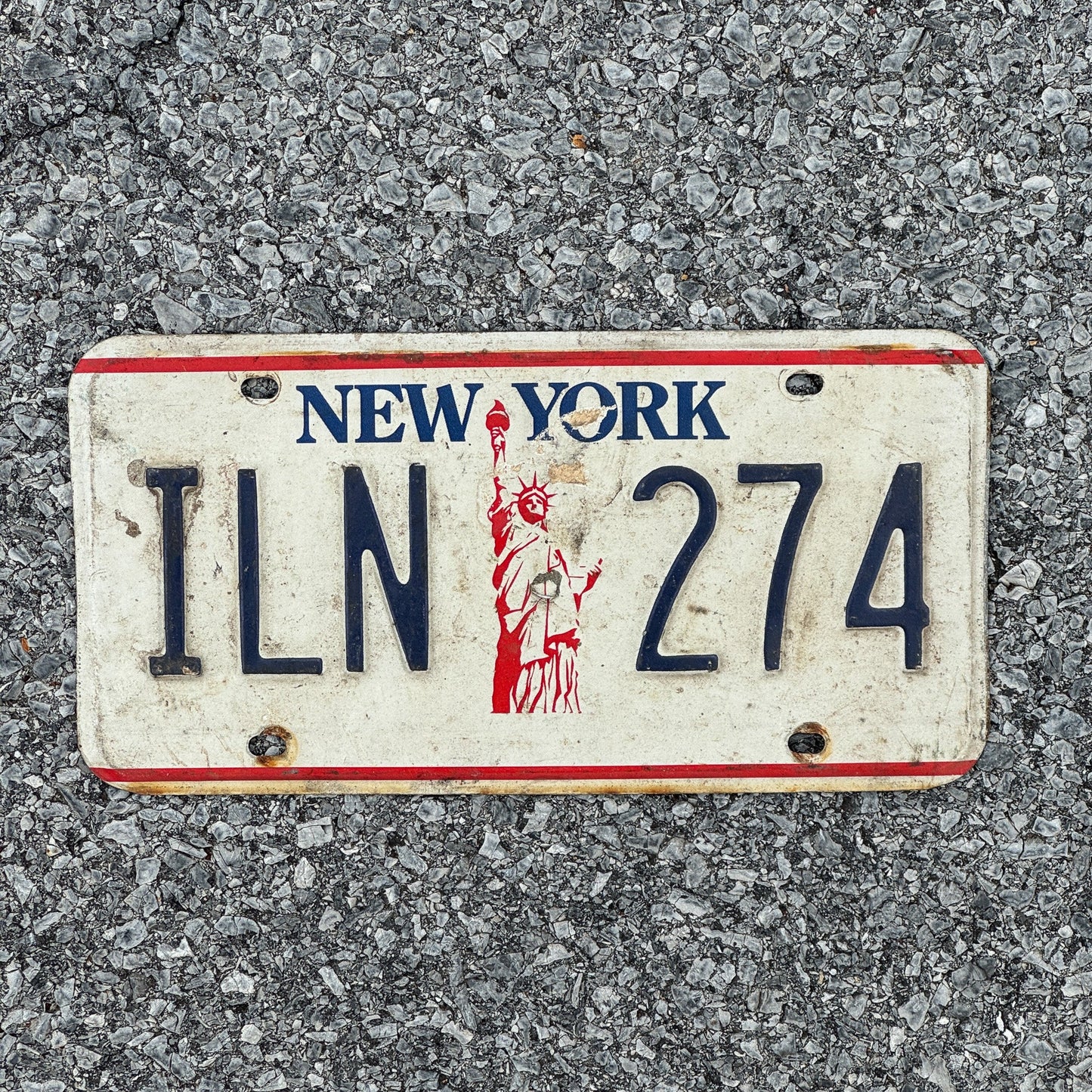 Photo of a 1986 New York License Plate Auto Tag Garage Decor Vintage Liberty Base ILN 274
