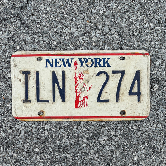 Photo of a 1986 New York License Plate Auto Tag Garage Decor Vintage Liberty Base ILN 274