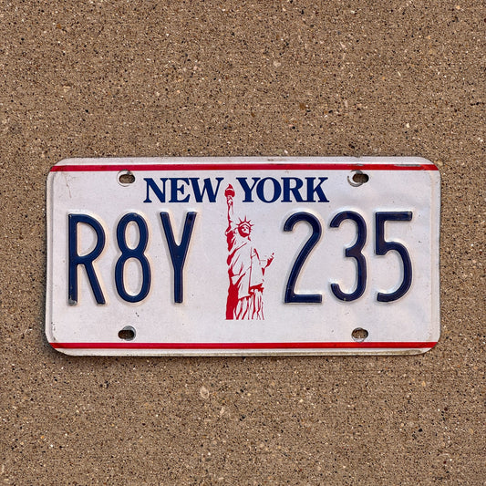 Photo of a 1986 New York License Plate Auto Tag Garage Decor Vintage Liberty Base R8Y 235