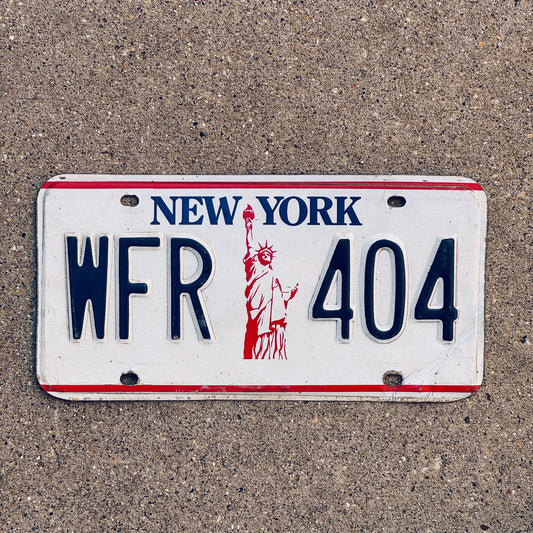 Photo of a 1986 New York License Plate Auto Tag Garage Decor Vintage Liberty Base WFR 404