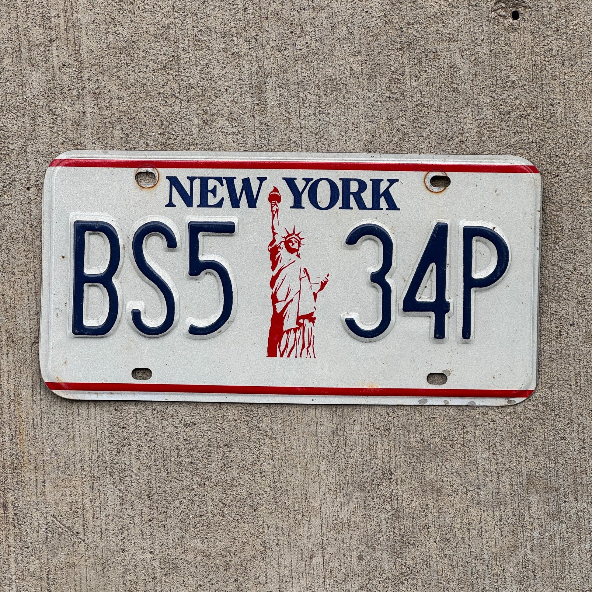 Photo of a 1986 New York License Plate Auto Tag Garage Decor Vintage Liberty, Tag 1 BS5 34P