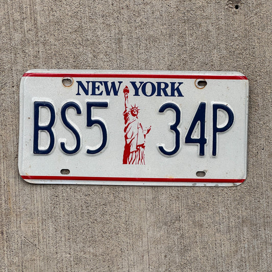 Photo of a 1986 New York License Plate Auto Tag Garage Decor Vintage Liberty, Tag 1 BS5 34P