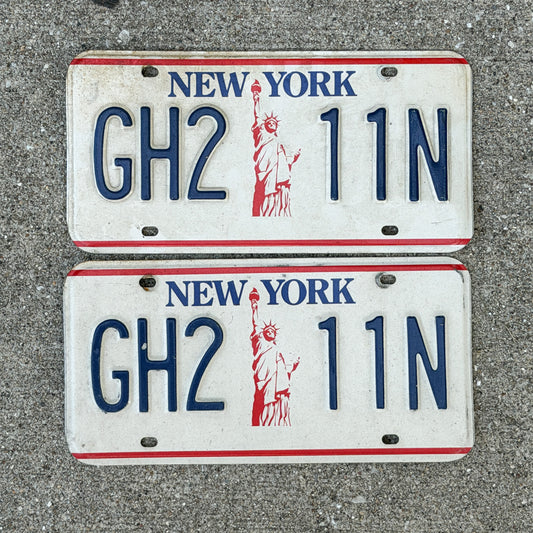 Photo of a 1986 New York License Plate Pair Auto Tag Garage Decor Vintage Liberty Base GH 2 11N with original patina