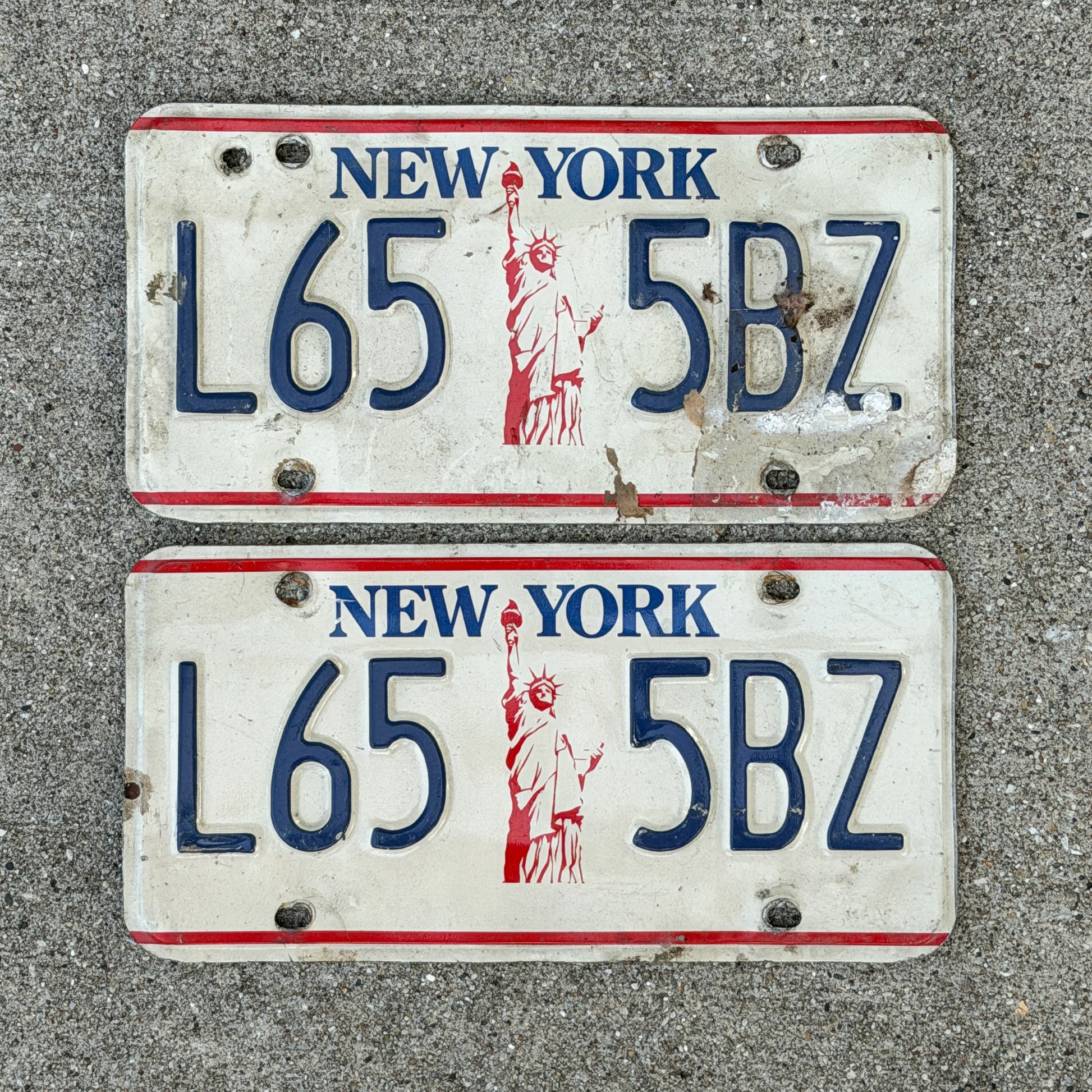 Photo of a 1986 New York License Plate Pair Auto Tag Garage Decor Vintage Liberty Base L65 5 BZ with original patina