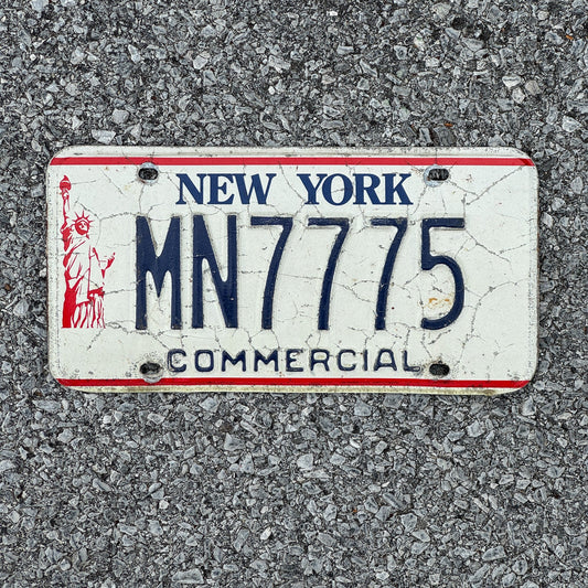 Photo of a 1986 New York Truck License Plate Auto Tag 1 Garage Decor Liberty Base 777 MN7775