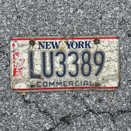 Photo of a 1986 New York Truck License Plate Auto Tag 1 Garage Decor Liberty Base LU3389