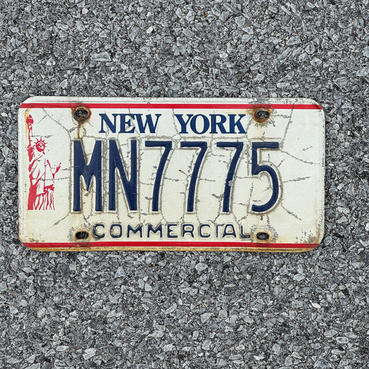 Photo of a 1986 New York Truck License Plate Auto Tag 2 Garage Decor Liberty Base 777 MN7775