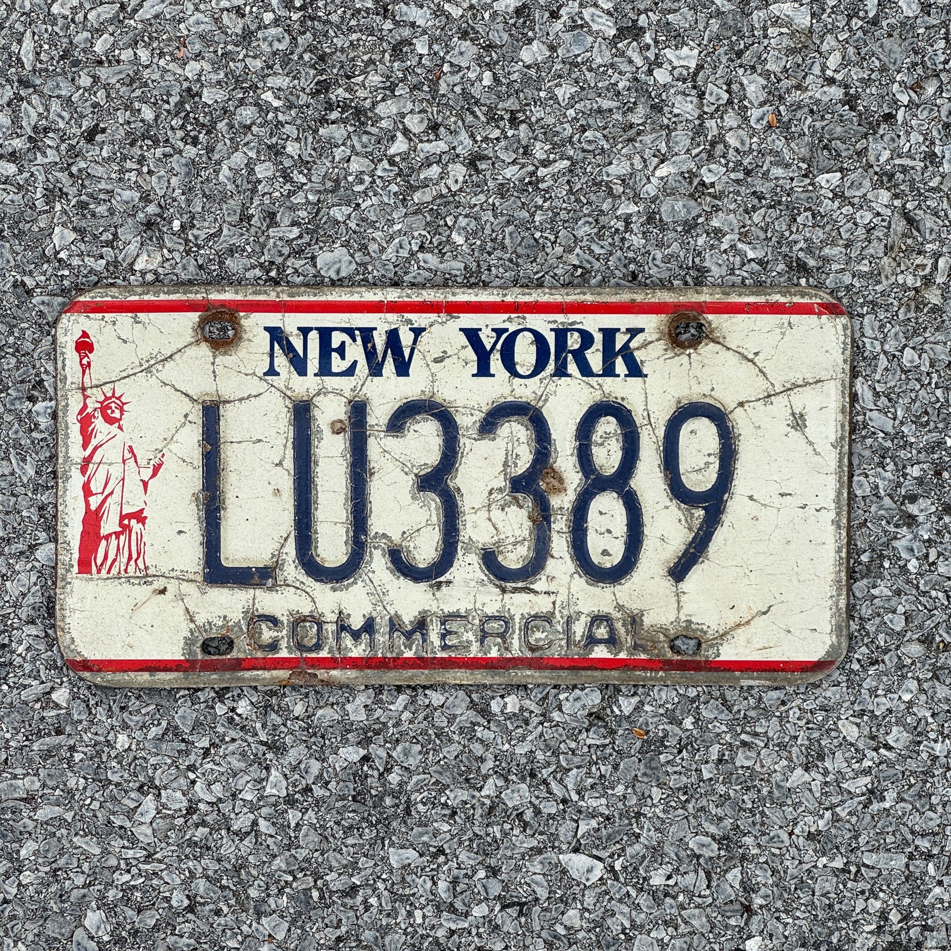 Photo of a 1986 New York Truck License Plate Auto Tag 2 Garage Decor Liberty Base LU3389