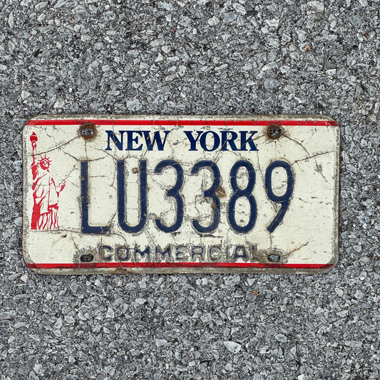 Photo of a 1986 New York Truck License Plate Auto Tag 2 Garage Decor Liberty Base LU3389