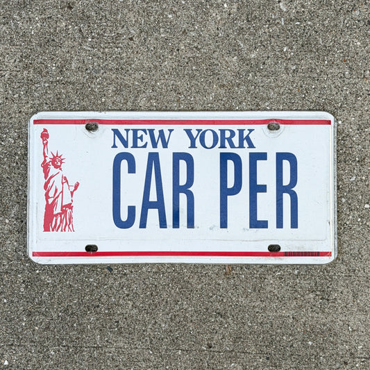 Photo of a 1986 New York Vanity License Plate Auto Tag Garage Decor Vintage Liberty Base CAR PER with original patina