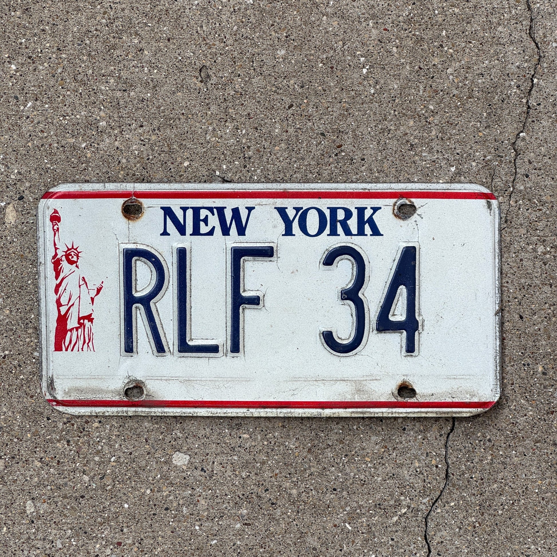 Photo of a 1986 New York VANITY License Plate Auto Tag Garage Decor Vintage Liberty Tag 1 RLF 34