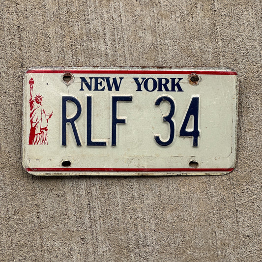 Photo of a 1986 New York VANITY License Plate Auto Tag Garage Decor Vintage Liberty Tag 2 RLF 34