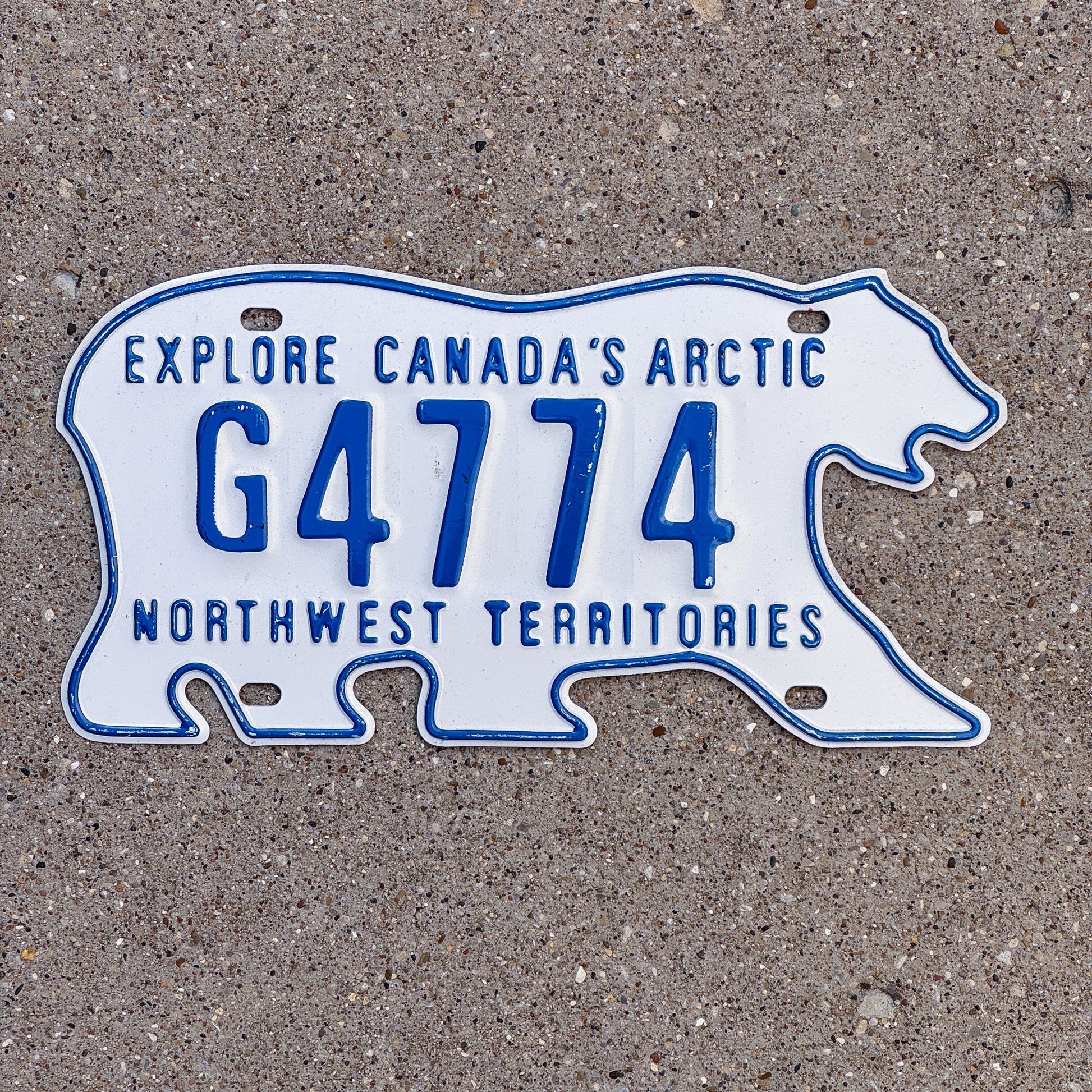 Photo of a 1986 Northwest Territories Government License Plate Auto Tag Garage Decor Vintage Polar Bear G 4774