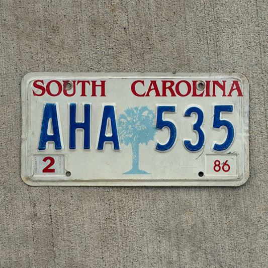 Photo of a 1986 South Carolina License Plate Auto Tag Garage Decor Vintage AHA 535 with original patina