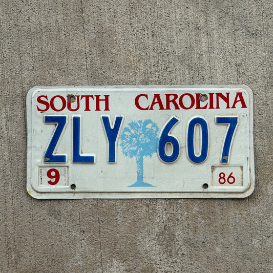 Photo of a 1986 South Carolina License Plate Auto Tag Garage Decor Vintage ZLY 607 with original patina