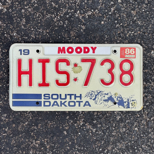 Photo of a 1986 South Dakota License Plate Auto Tag Garage Decor Vintage HIS 738