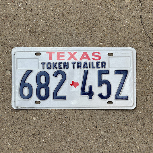 Photo of a 1986 Texas Token Trailer License Plate Auto Tag Garage Decor Vintage 682 45Z