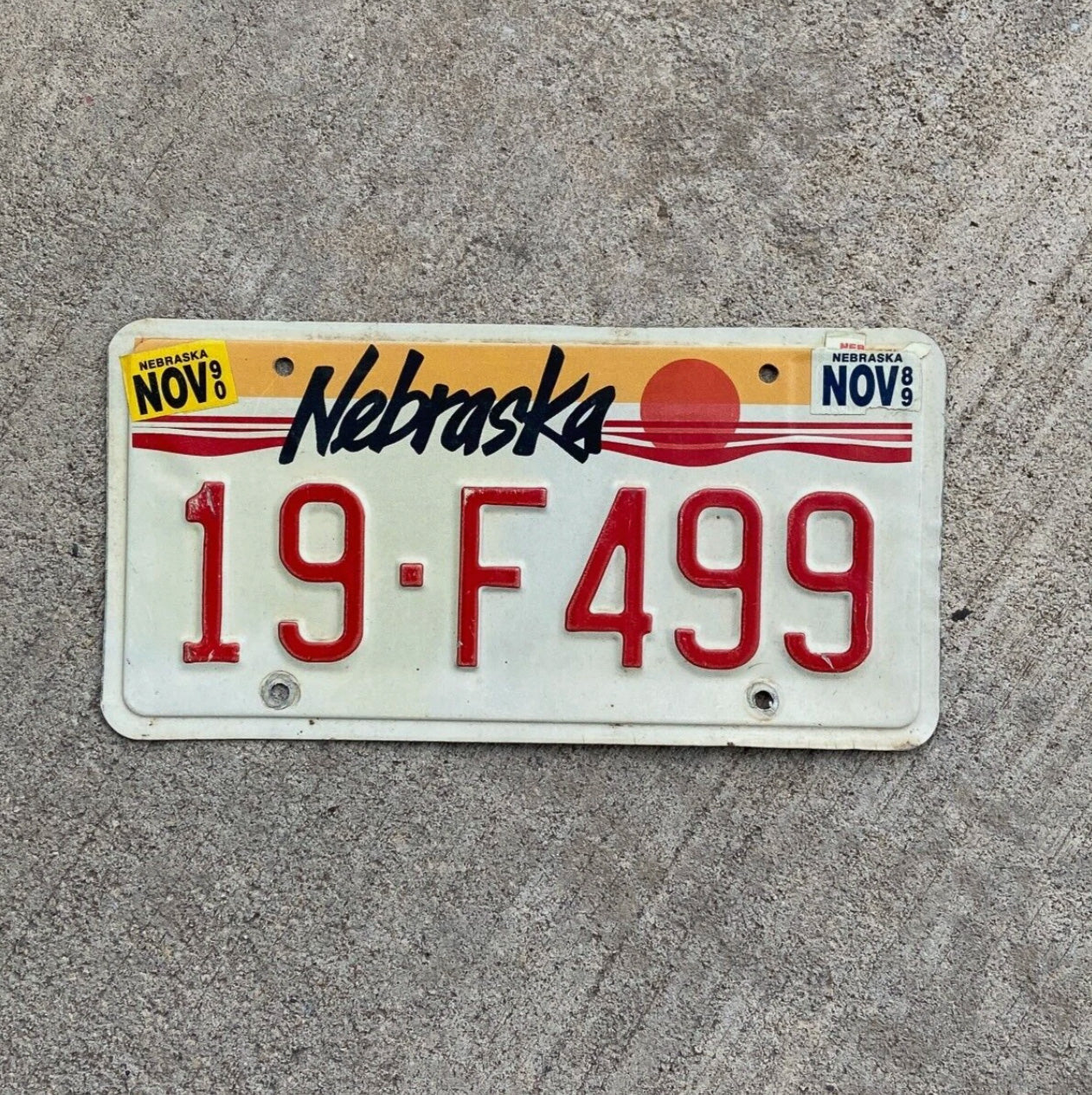 Photo of a 1987 1990 Nebraska License Plate Auto Tag Garage Decor Vintage 19 F 499 with original patina