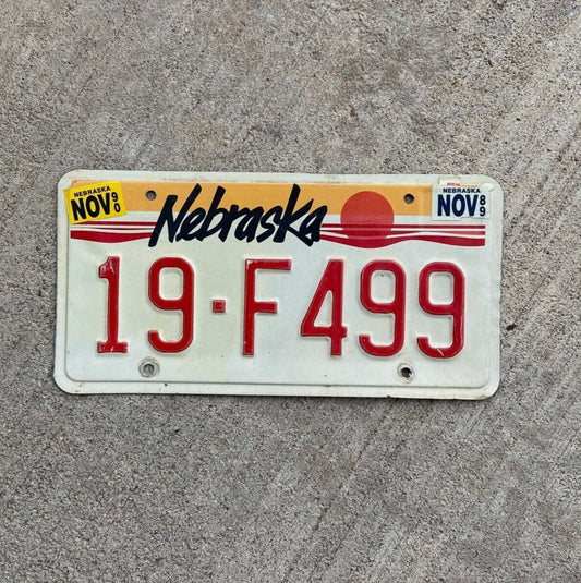 Photo of a 1987 1990 Nebraska License Plate Auto Tag Garage Decor Vintage 19 F 499 with original patina