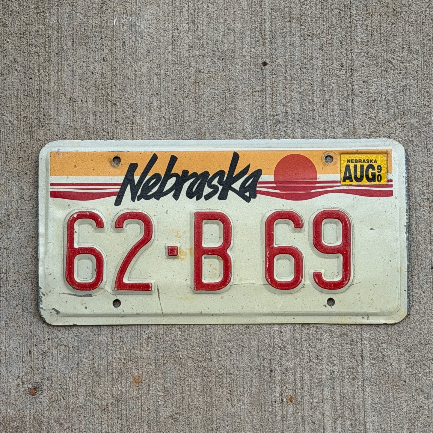 Photo of a 1987 1990 Nebraska License Plate Auto Tag Garage Decor Vintage 62 B 69 with original patina