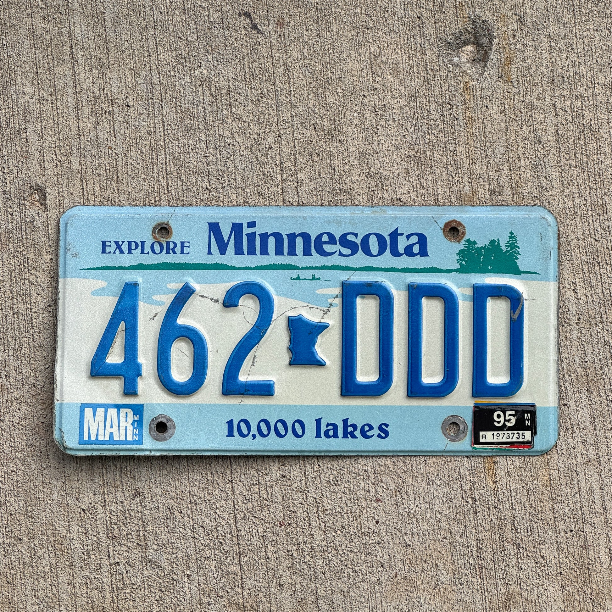 Photo of a 1987 1995 Minnesota License Plate Auto Tag Garage Decor Vintage Repeat Repeating 462 DDD with original patina