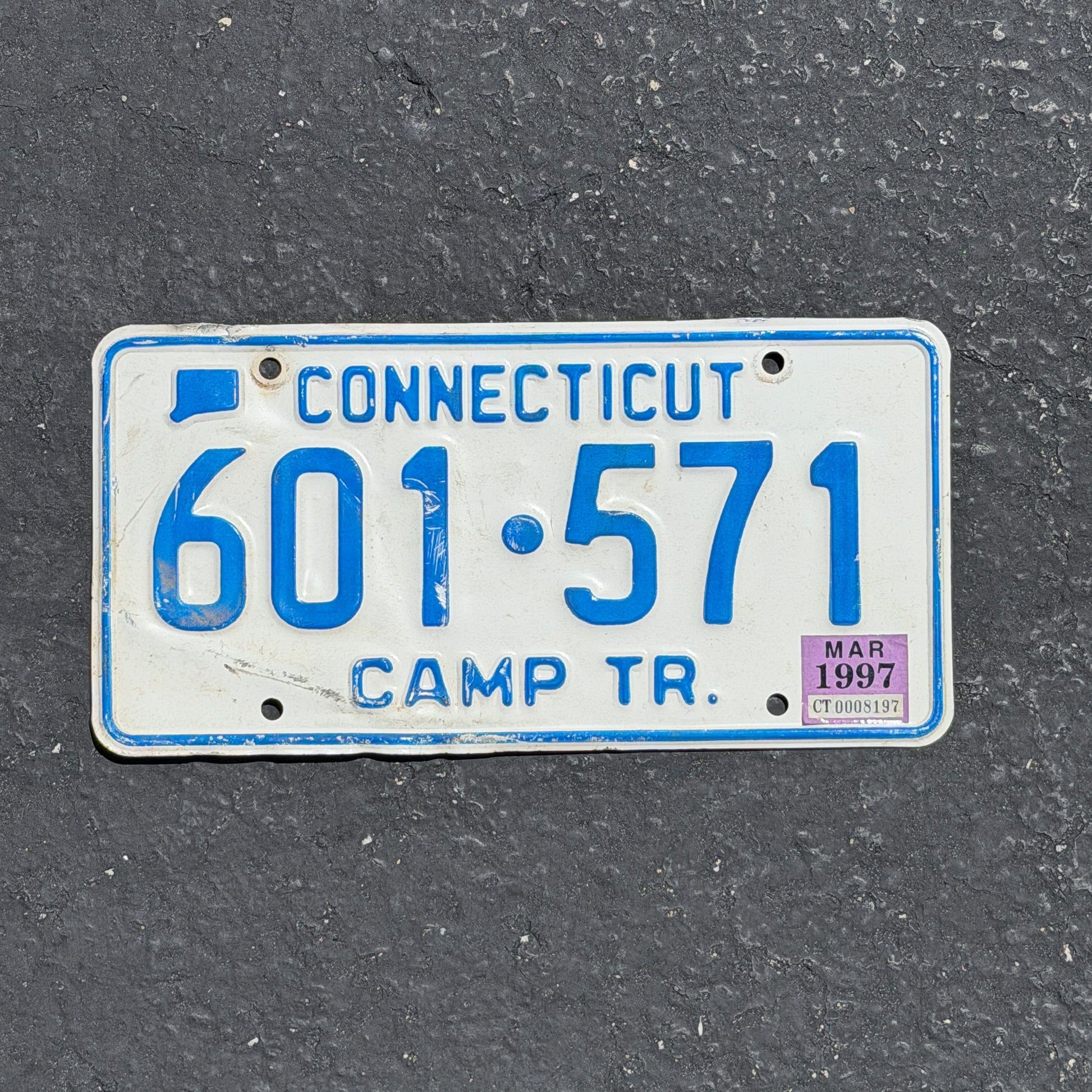 Photo of a 1987 1997 Connecticut Camp Trailer License Plate Auto Tag Garage Decor Vintage 601 571 with original patina