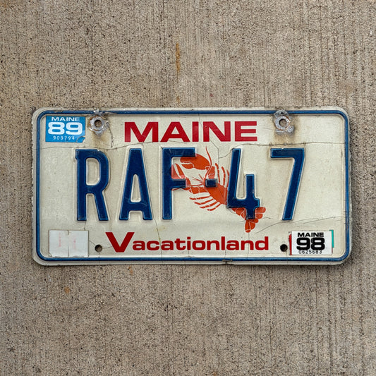 Photo of a 1987 1998 Maine Vanity License Plate Auto Tag Garage Decor Vintage Lobster RAF 47 with original patina