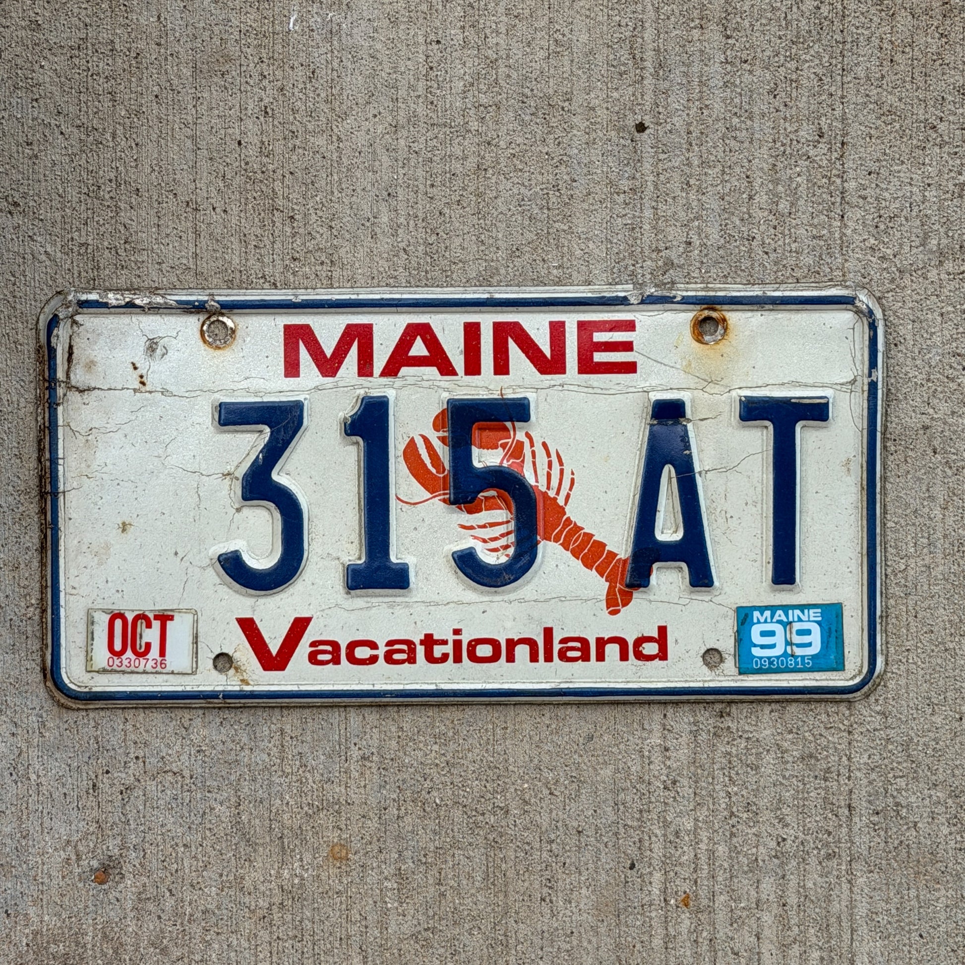 Photo of a 1987 1999 Maine License Plate Auto Tag Garage Decor Vintage Lobster 315 AT with original patina