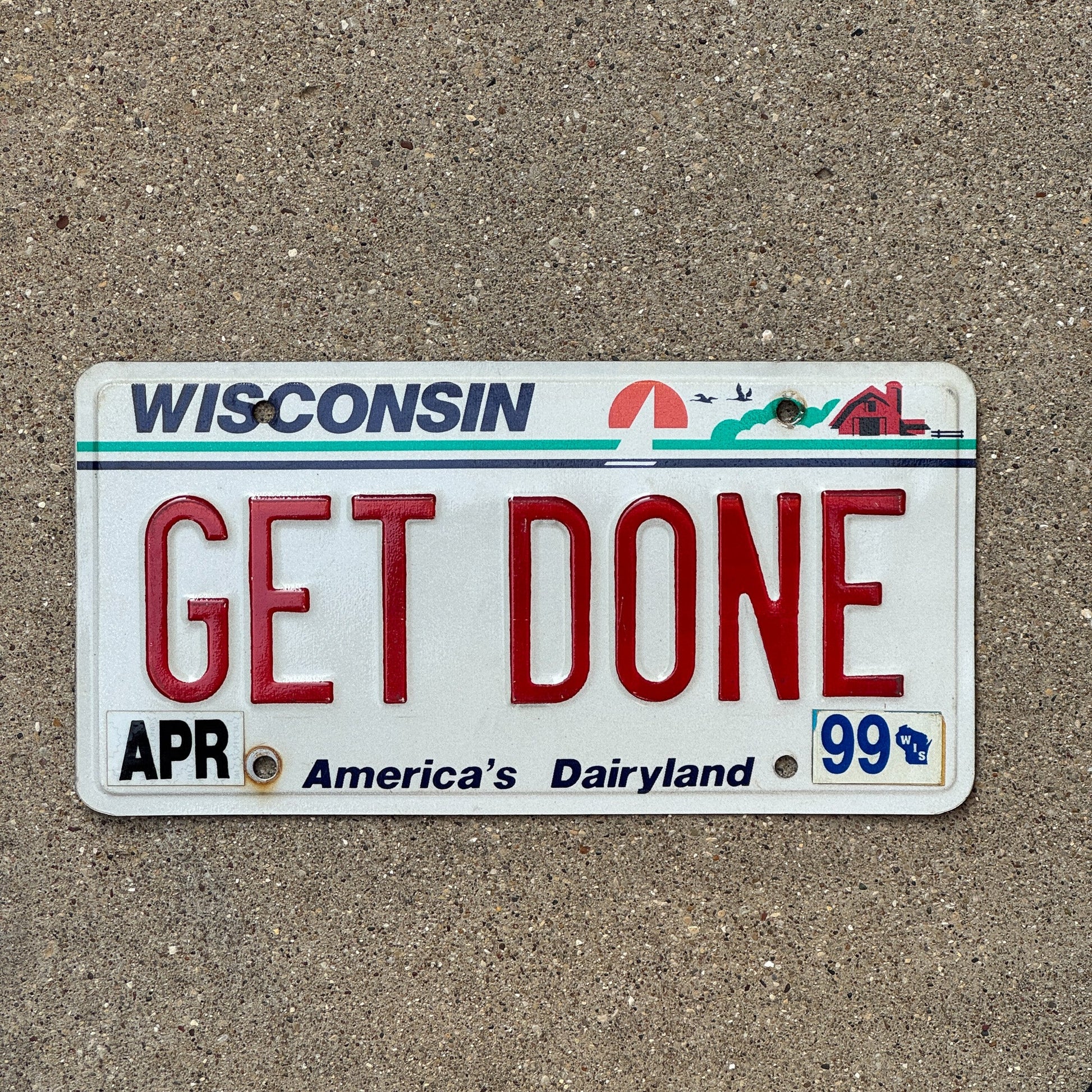 Photo of a 1987 1999 Wisconsin Vanity License Plate Auto Tag Garage Decor Vintage GET DONE