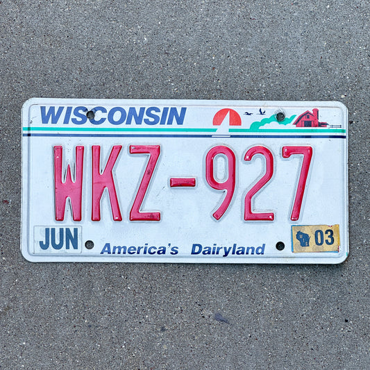 Photo of a 1987 2003 Wisconsin License Plate Auto Tag Garage Decor Vintage WKZ 927 with original patina
