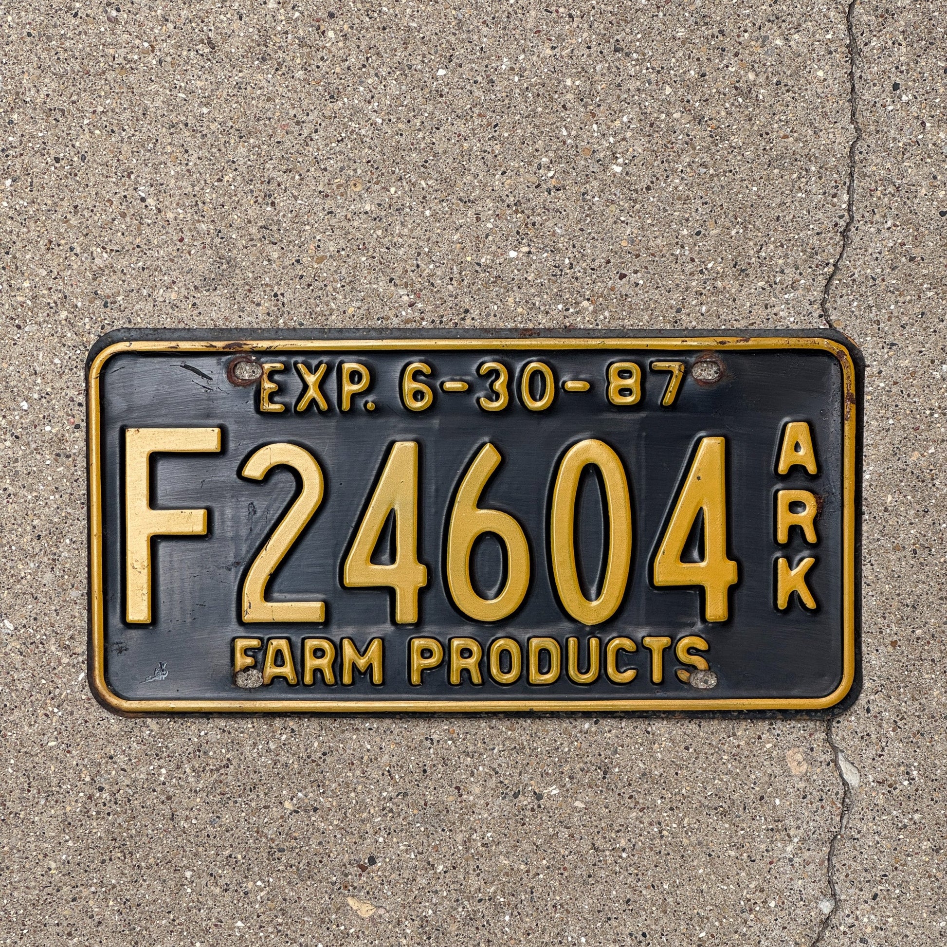 Photo of a 1987 Arkansas Farm Products License Plate Auto Tag Garage Decor Vintage F 24604