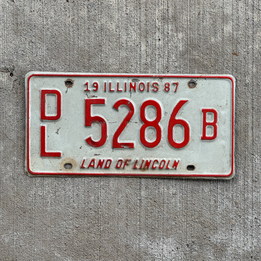 Photo of a 1987 Illinois Dealer License Plate Auto Tag 1 Vintage Garage 5286 B with original patina