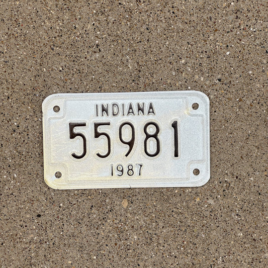 Photo of a 1987 Indiana Motorcycle License Plate Auto Tag Garage Decor Vintage 55981